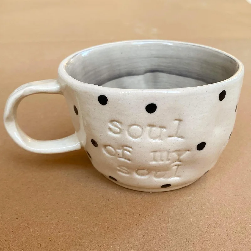 Chic matte mugs for modern style-Soul of my soul wobbly mug in grey. Proceeds from this mug go to Gaza. These mugs are hand built so each mug will be different in its crookedness and wobbliness. No two are the same.